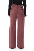 Burgundy New York jeans featuring a flattering mid-to-high-rise fit, streamlined silhouette, and comfortable stretch denim. The versatile style offers an effortless look for everyday wear or elevated outfits.