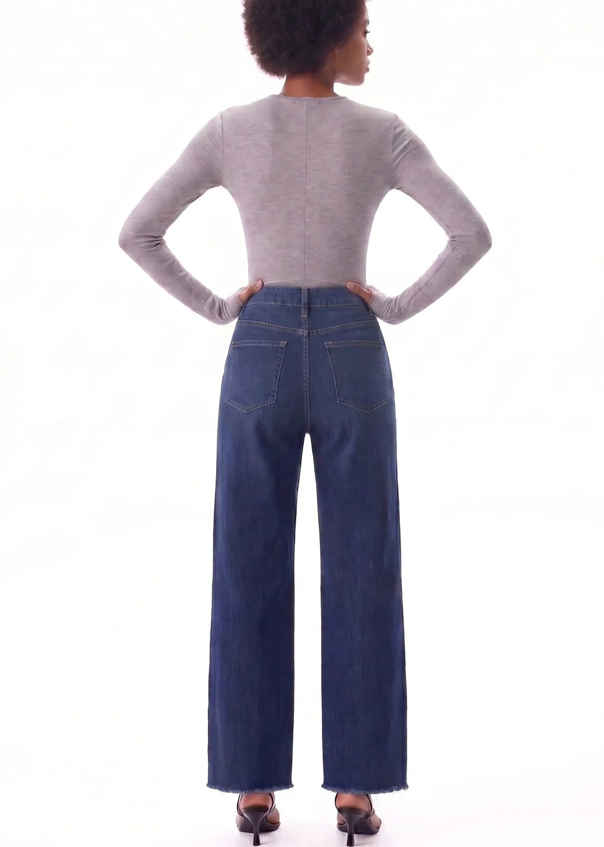 Bayeas New York high-rise wide-leg jeans featuring unique seaming, a flattering silhouette, and raw-edge hem for a modern, effortlessly edgy look.