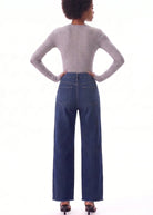 Bayeas New York high-rise wide-leg jeans featuring unique seaming, a flattering silhouette, and raw-edge hem for a modern, effortlessly edgy look.