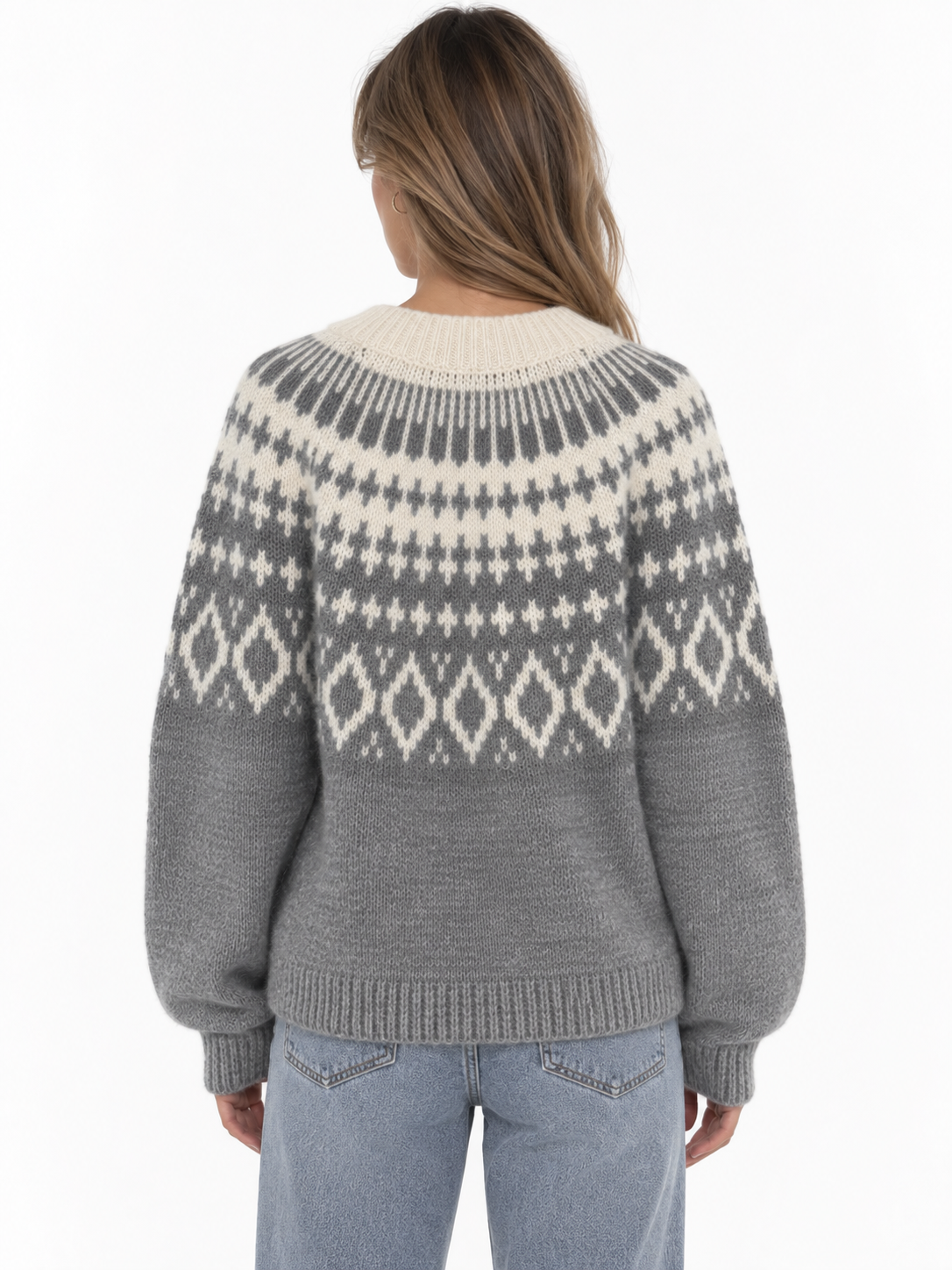 The Brielle Knit Pullover is your new go-to for cozy days. Designed in a soft grey knit with a contrasting cream Nordic-inspired pattern, it features a relaxed fit, classic crew neckline, and easy long sleeves. The perfect statement knit to throw on with denim for an effortlessly put-together fall and winter look.