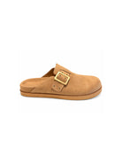 Chinese Laundry Cove suede clogs in natural tan, featuring a rounded closed toe, adjustable strap with gold buckle detailing, and a comfortable slip-on design.