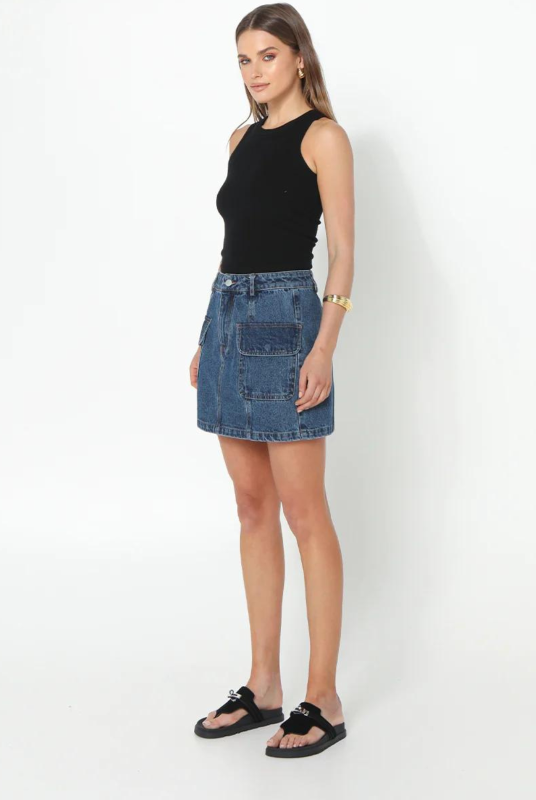 Madison The Label Darcy Mini Skirt. Dark blue denim high waisted denim mini skirt.