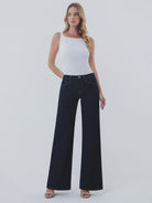Dark wash wide-leg jeans featuring a mid-rise waist, trouser-inspired front crease, classic five-pocket design, finished hem, and full-length silhouette.