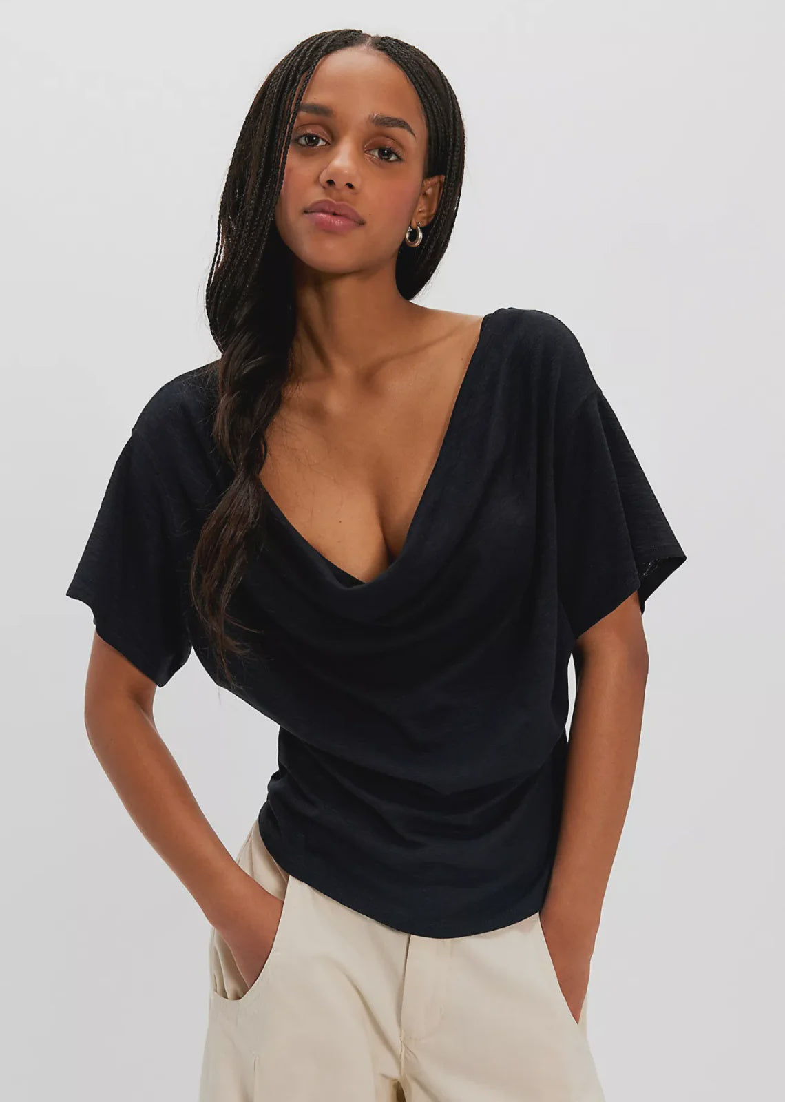 black cowl neck top. mid - full length and loose fitted short sleeves