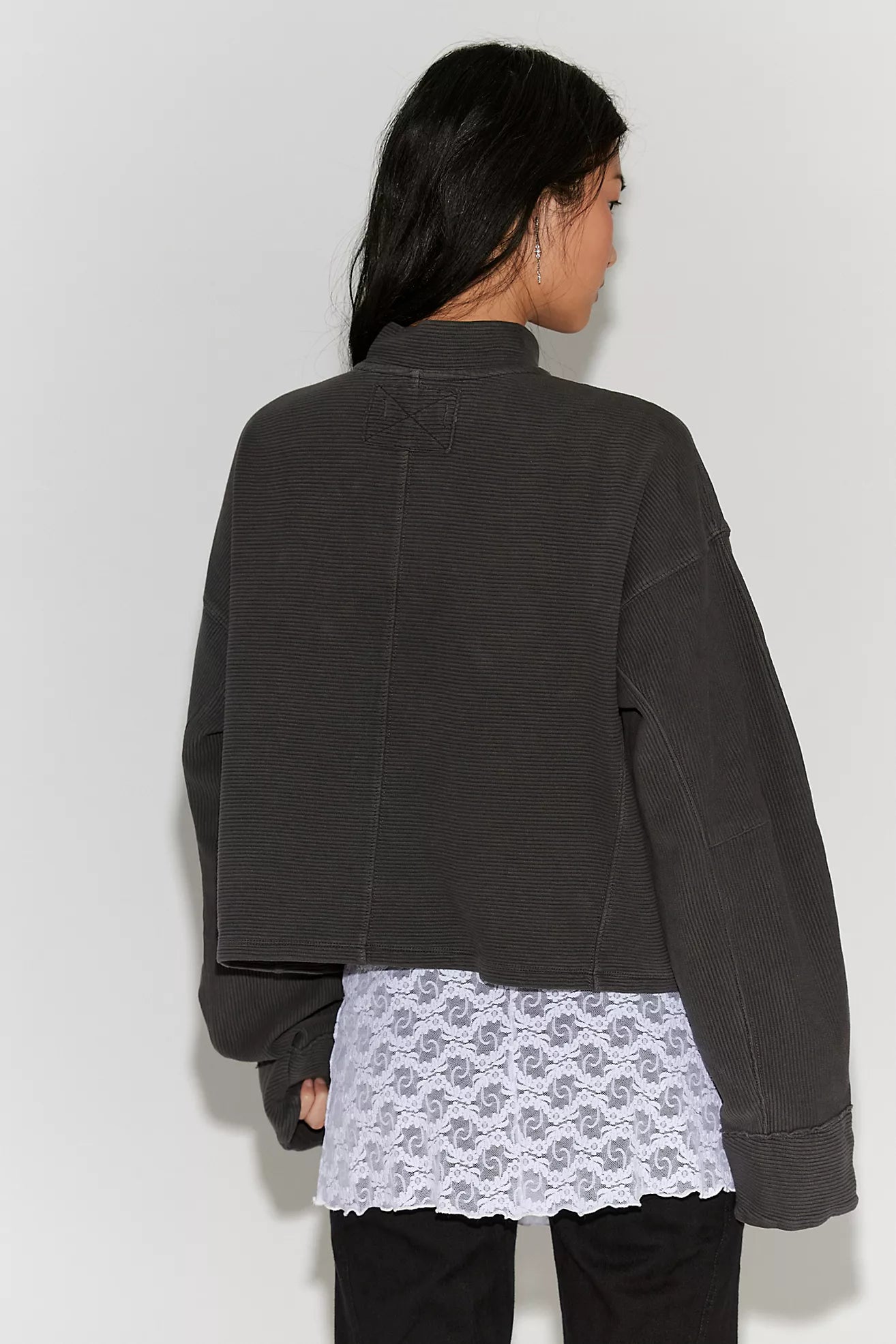 washed black quarter zip sweater. mid length / oversized 