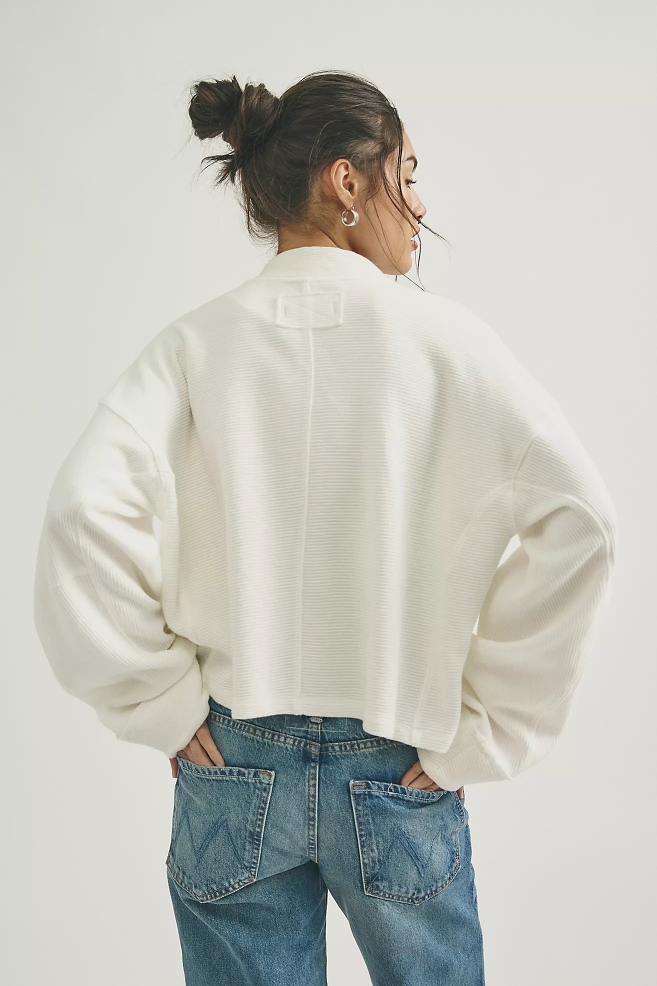 cotton ripped quarter zip sweater in clean ivory. mid length / oversized 