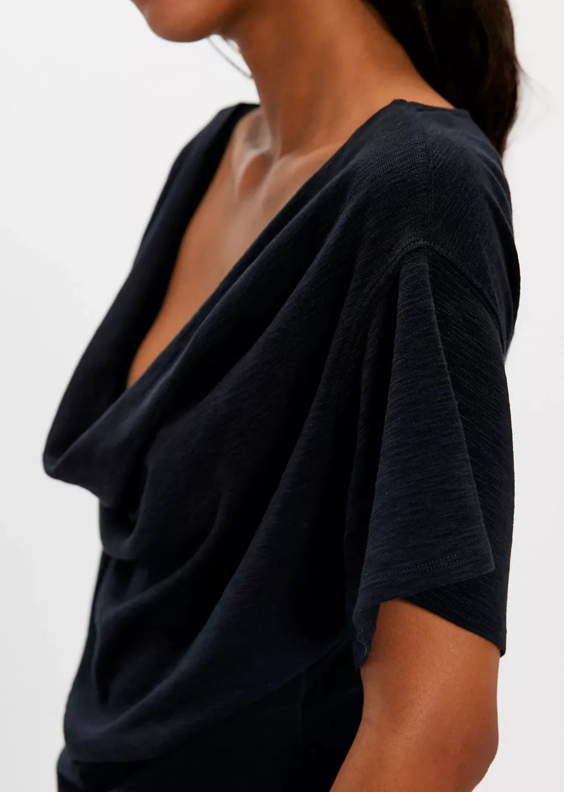 black cowl neck top. mid - full length and loose fitted short sleeves