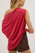 Cascadia Tunic in Berry Twist featuring a draped off-the-shoulder neckline, soft slinky jersey fabric, ruched detailing, long sleeves, a relaxed longline silhouette, and an asymmetrical hem.