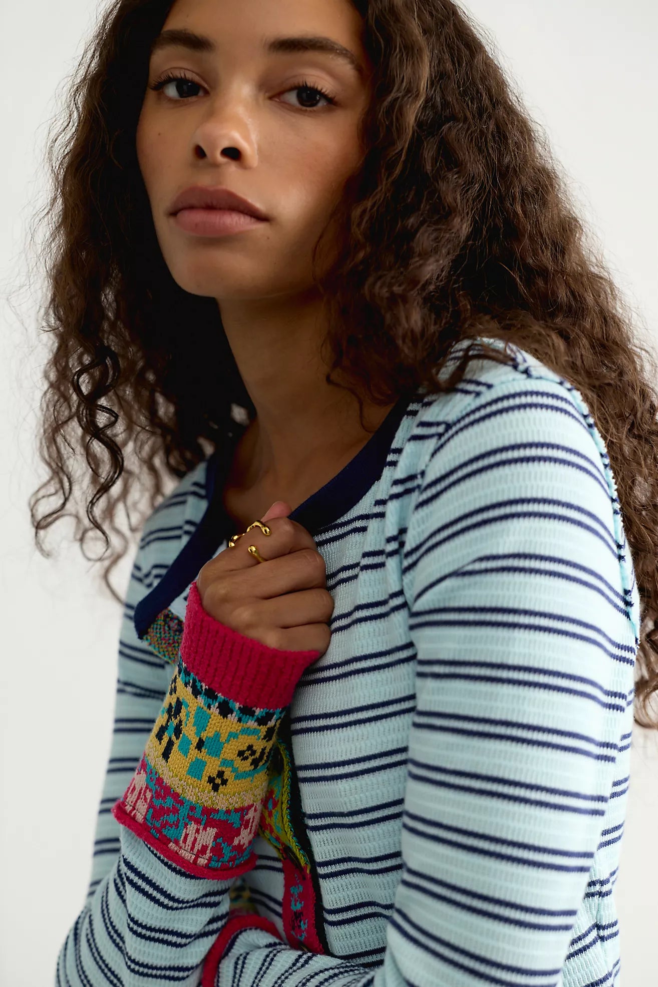 Free People Noa Cardi in Blue Pop Combo featuring a fitted silhouette, soft ribbed cotton fabric, blue and white horizontal stripes, crew neckline, long sleeves, button-front closure, and colourful embroidered detailing along the front panels and cuffs.