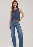 Blaise denim tank top in washed denim with contrast topstitching details and a back keyhole closure, designed for a relaxed, lived-in look.