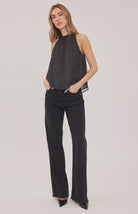 Lenora blouse in crinkled chiffon with a mock neckline, long sleeves, and a feminine back tie detail. Fully lined for comfortable wear and available in Black Print and Cream Print.