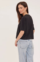 Codie t-shirt in a soft cotton-modal blend with a classic crew neckline, short sleeves, and a relaxed everyday fit. Available in Black and Cream.