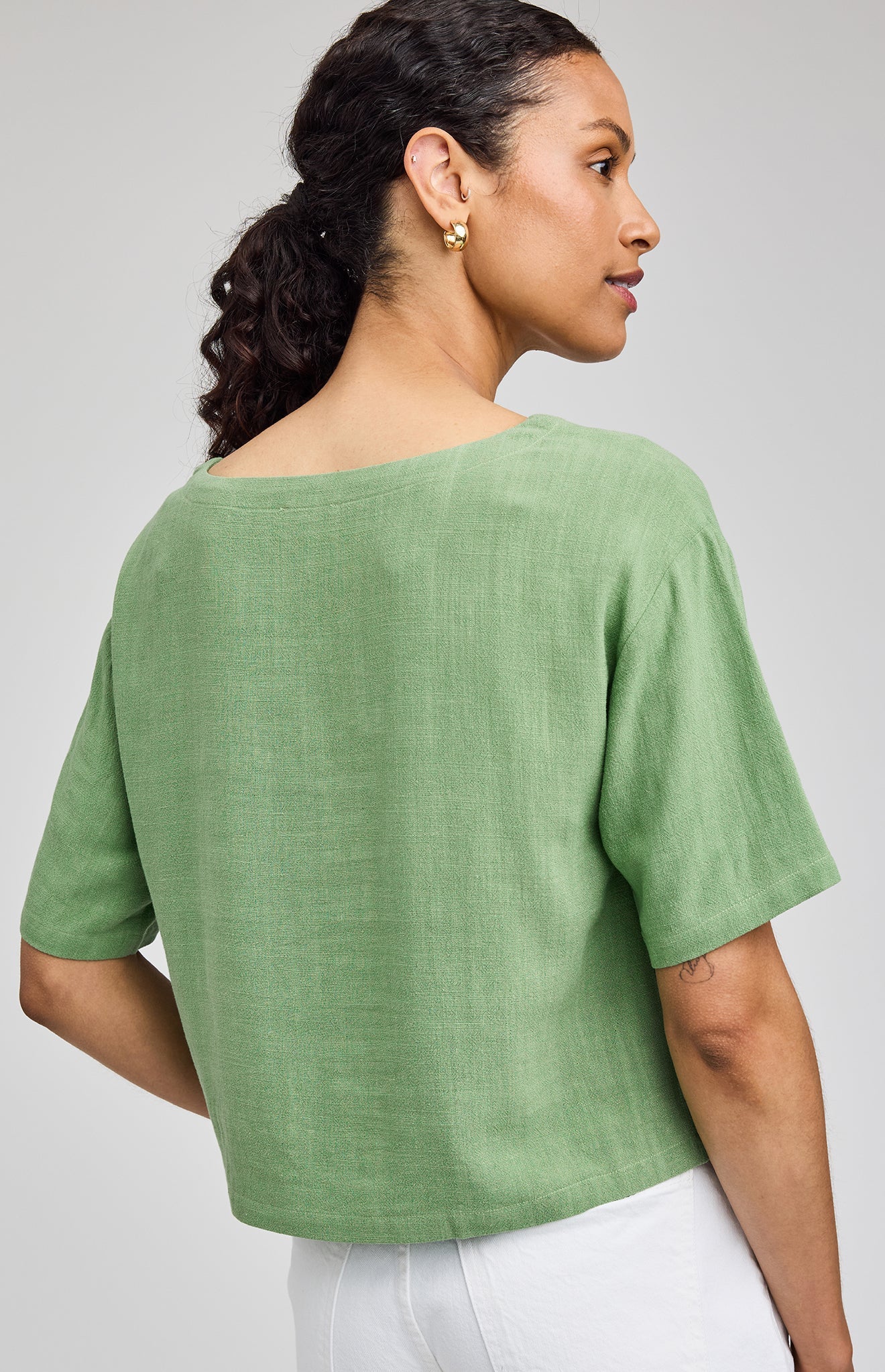 Jade Green Gemini top in a lightweight rayon-linen blend featuring a boat neckline, side slits, and a relaxed, easy-to-style silhouette.