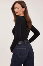 Lexy top in a stretchy ribbed fabric with a body-hugging contour fit, scoop neckline, and delicate scalloped edge for a feminine finish. Available in Black and Smoke.