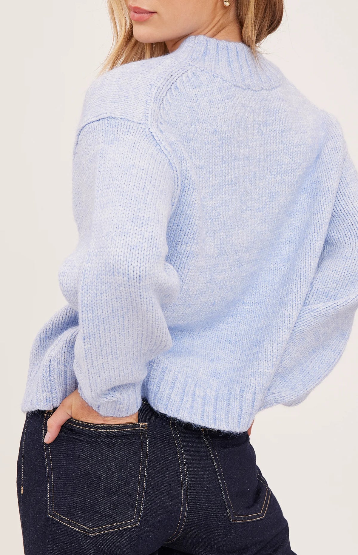 Tova sweater in a soft heathered knit with an oversized crew neckline, relaxed fit, and perfectly cropped length. Available in Heather Pebble and Heather Skyline.