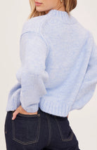 Tova sweater in a soft heathered knit with an oversized crew neckline, relaxed fit, and perfectly cropped length. Available in Heather Pebble and Heather Skyline.
