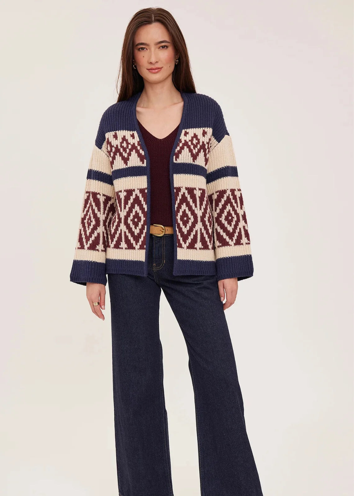 Dorian cardigan in soft, cozy yarn featuring a custom jacquard pattern and relaxed fit.