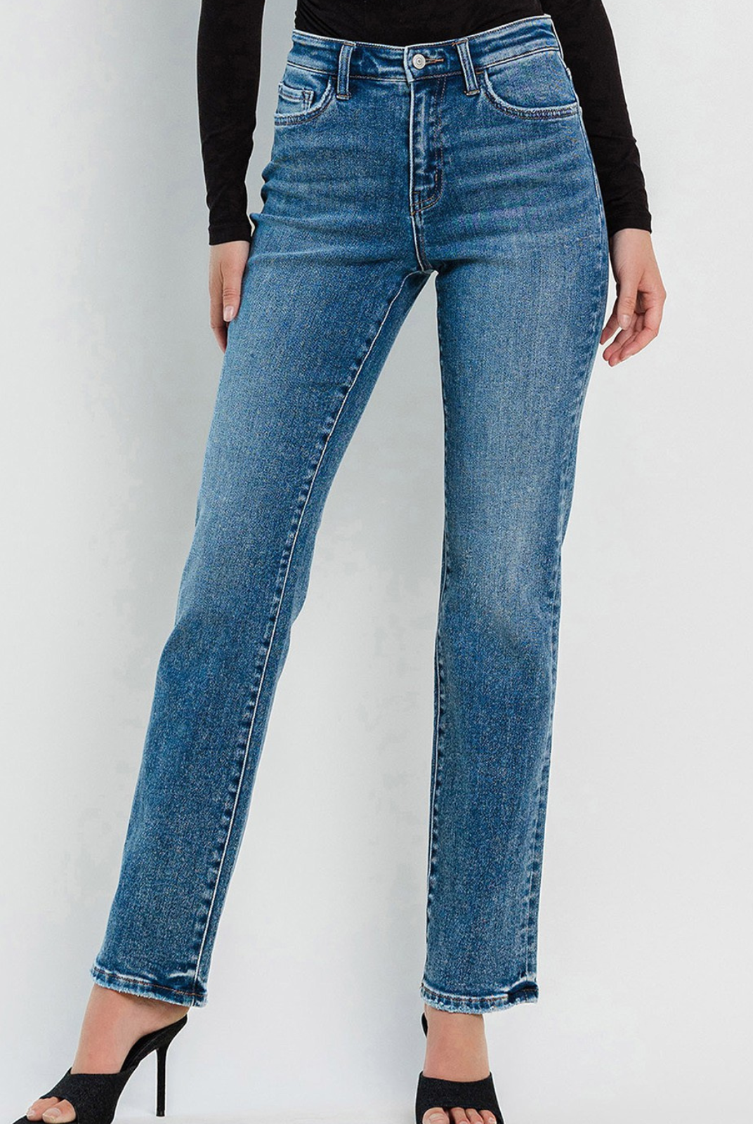 Flying Monkey High Rise Straight. Slip into the ultimate comfort and style with our Illuminate High Rise Straight Jeans. Made with stretch denim, they provide all-day comfort and a flattering fit. The high rise waist accentuates your figure while the full length and straight cut give you a sleek and versatile look. 