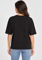 ICHI IHPETRO Shirt in Black/Silver Studs featuring a relaxed fit, classic crew neckline, dropped shoulders, and scattered silver stud embellishments across the front. Crafted from soft cotton with a solid black back for a casual yet edgy look.