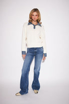 Relaxed cotton knit sweater in Oxford Denim featuring a contrasting denim collar for a polished, preppy look.