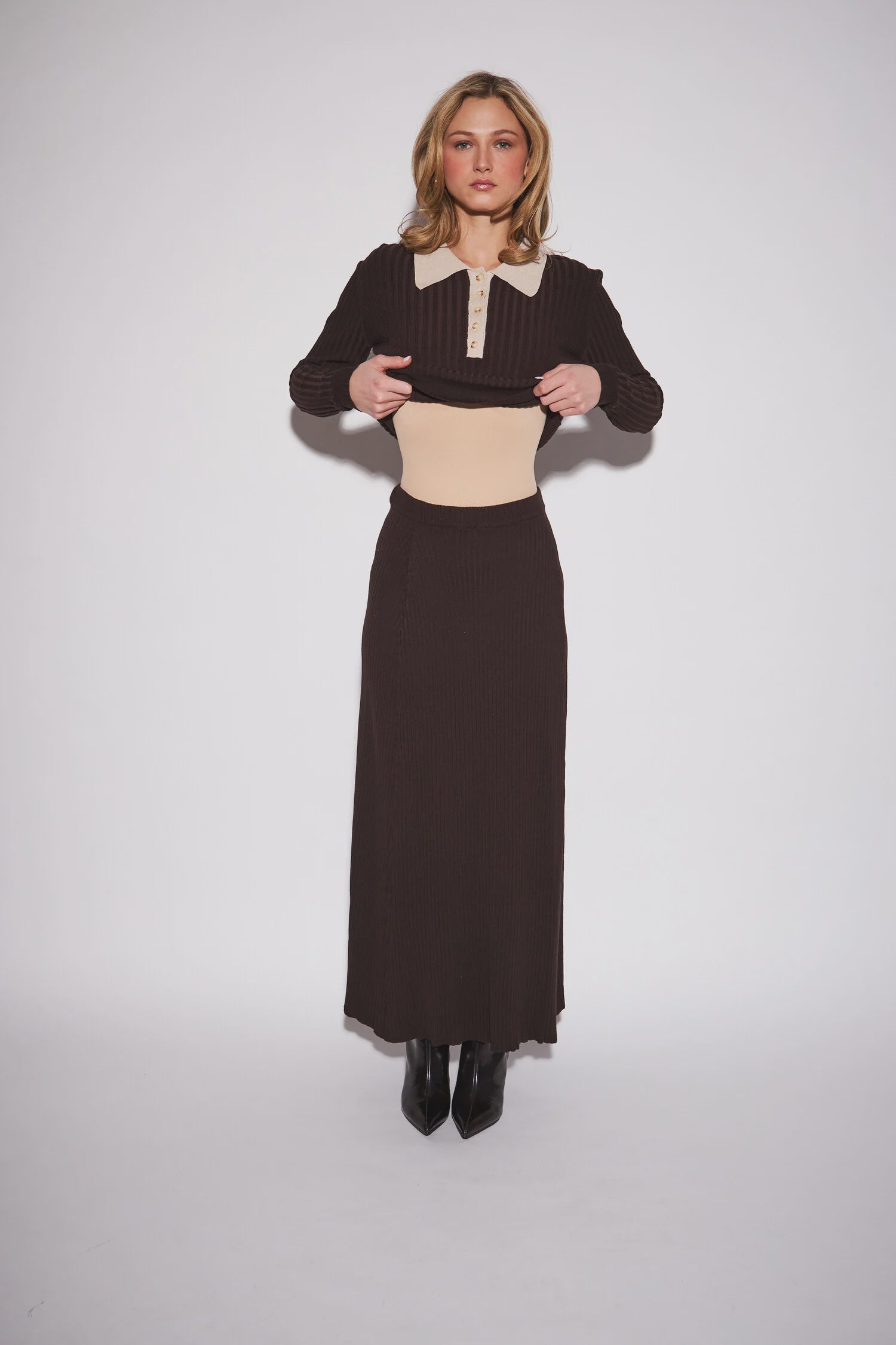 Gia Knit Skirt featuring a sleek, close-fitting silhouette and streamlined column shape for an elegant, minimalist look.