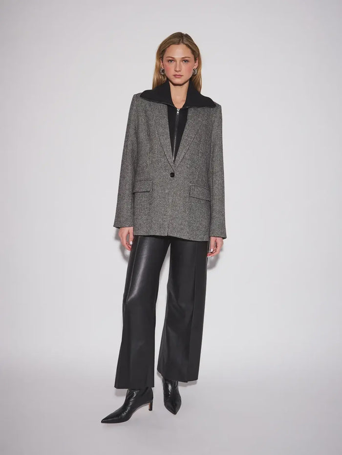 John & Jenn Hayes Blazer featuring a classic herringbone pattern, structured fit, elongated silhouette, and subtle texture for a polished, menswear-inspired look.