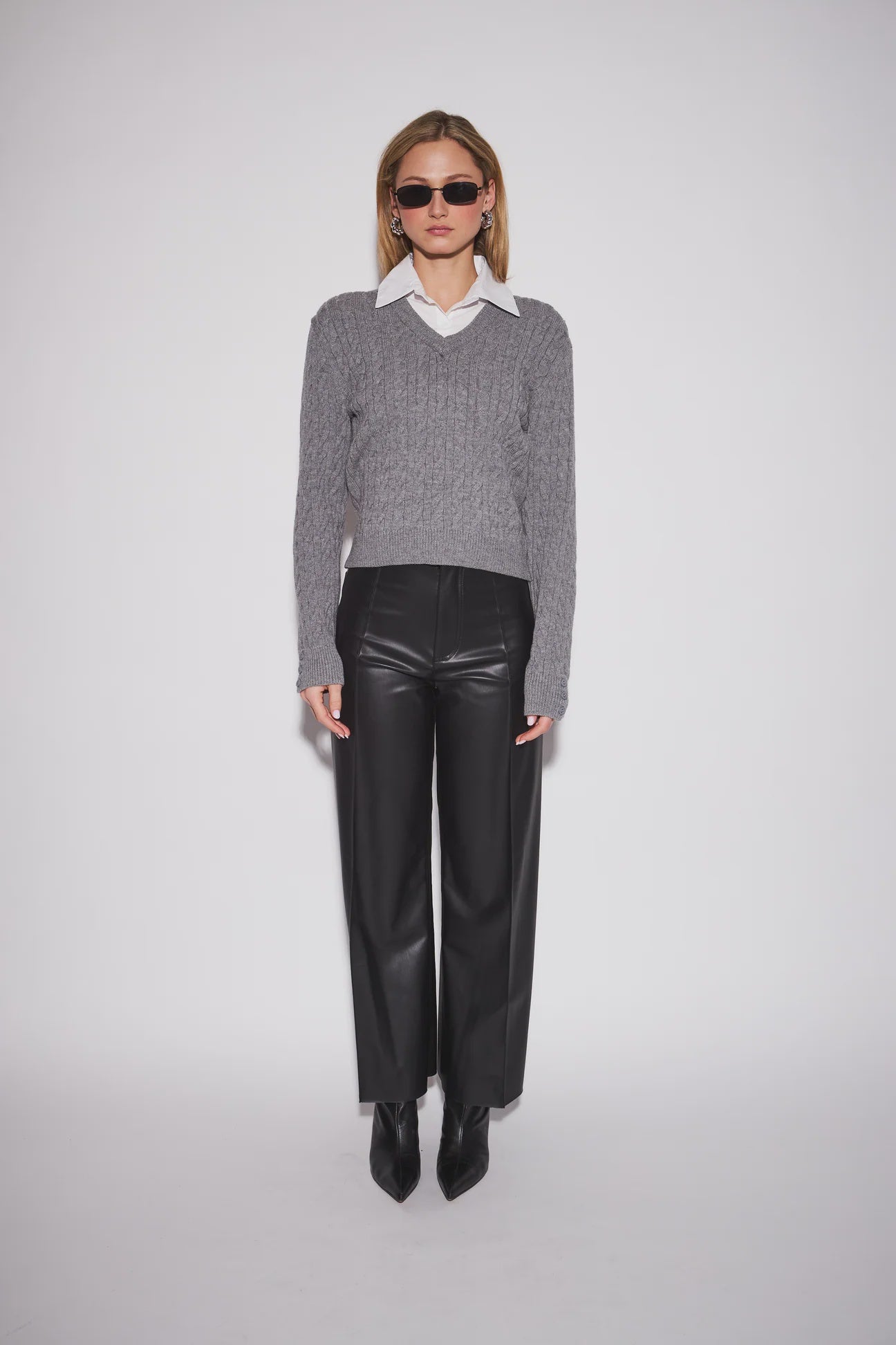 John & Jenn Renn Cable-Knit Sweater featuring a classic textured cable-knit design and contrasting collar for a preppy, collegiate-inspired look with timeless appeal.