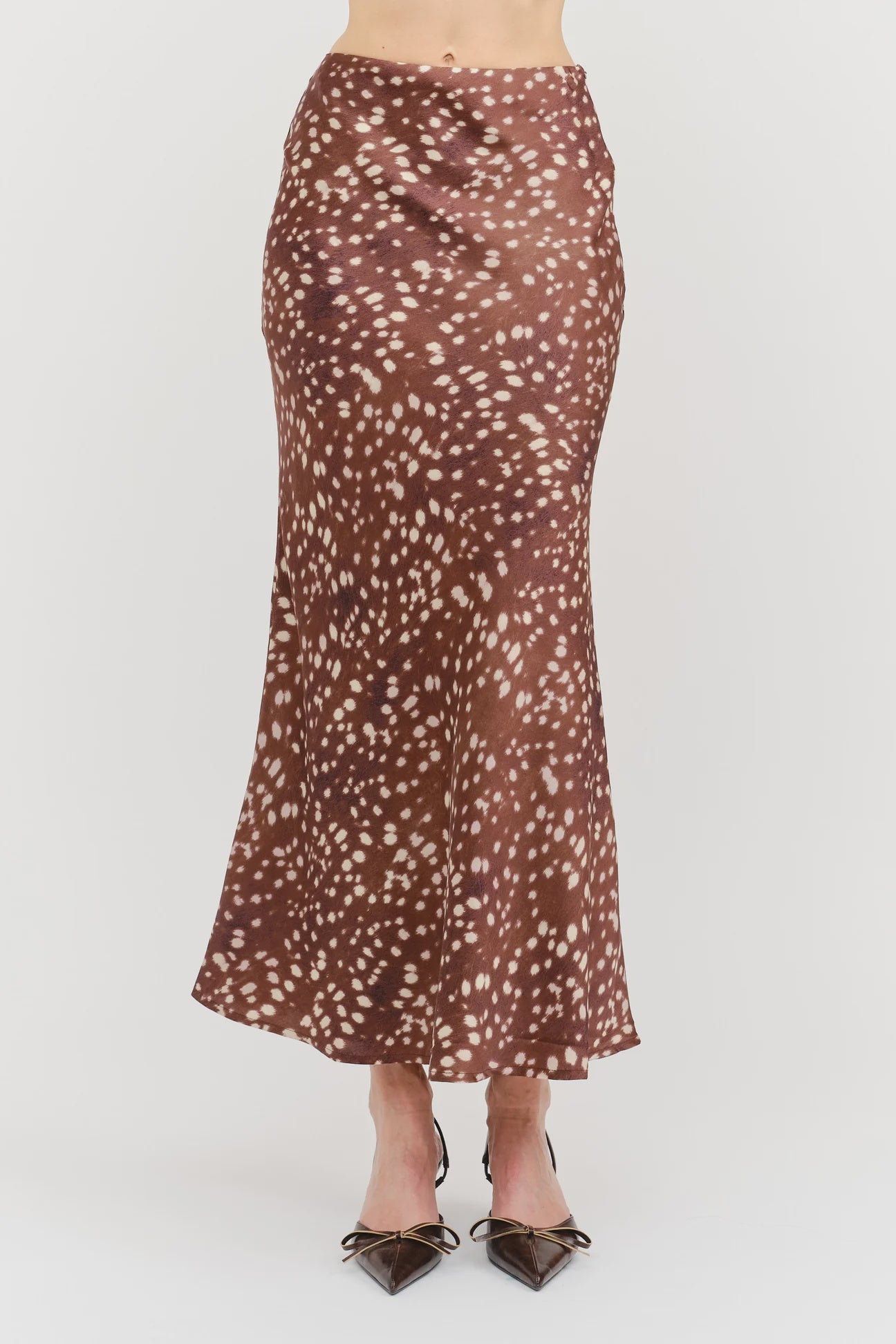 Kalila Midi Skirt in soft brown featuring a white deer print, flattering mermaid silhouette, and flowing ankle-length hem.