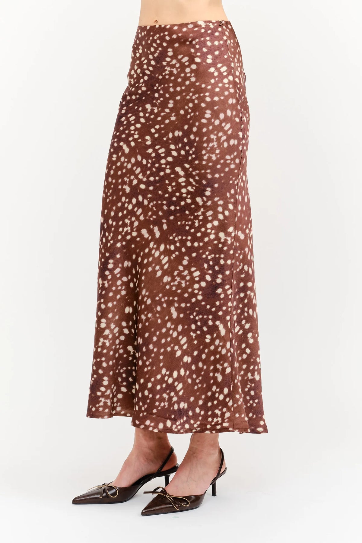 Kalila Midi Skirt in soft brown featuring a white deer print, flattering mermaid silhouette, and flowing ankle-length hem.