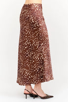 Kalila Midi Skirt in soft brown featuring a white deer print, flattering mermaid silhouette, and flowing ankle-length hem.