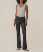 High-rise kick flare pants in Matte Black featuring a sleek coated finish, Fab Ab front pockets, inset leg detailing, and a flattering flared silhouette.
