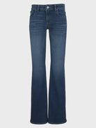 Blue wash bootcut jeans with a flattering mid-rise fit, five-pocket styling, and a subtle flared leg. Designed with comfortable stretch and smoothing front pocket technology for an effortlessly polished look.
