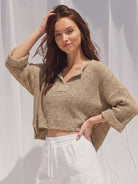 The Lora Chunky Crop Sweater brings an effortlessly relaxed feel to your everyday wardrobe. Designed with a loose, slouchy fit, this cozy cropped sweater features a flattering V-neckline, relaxed ¾ sleeves, and contrasting solid patch details at the front and back for a subtle statement.