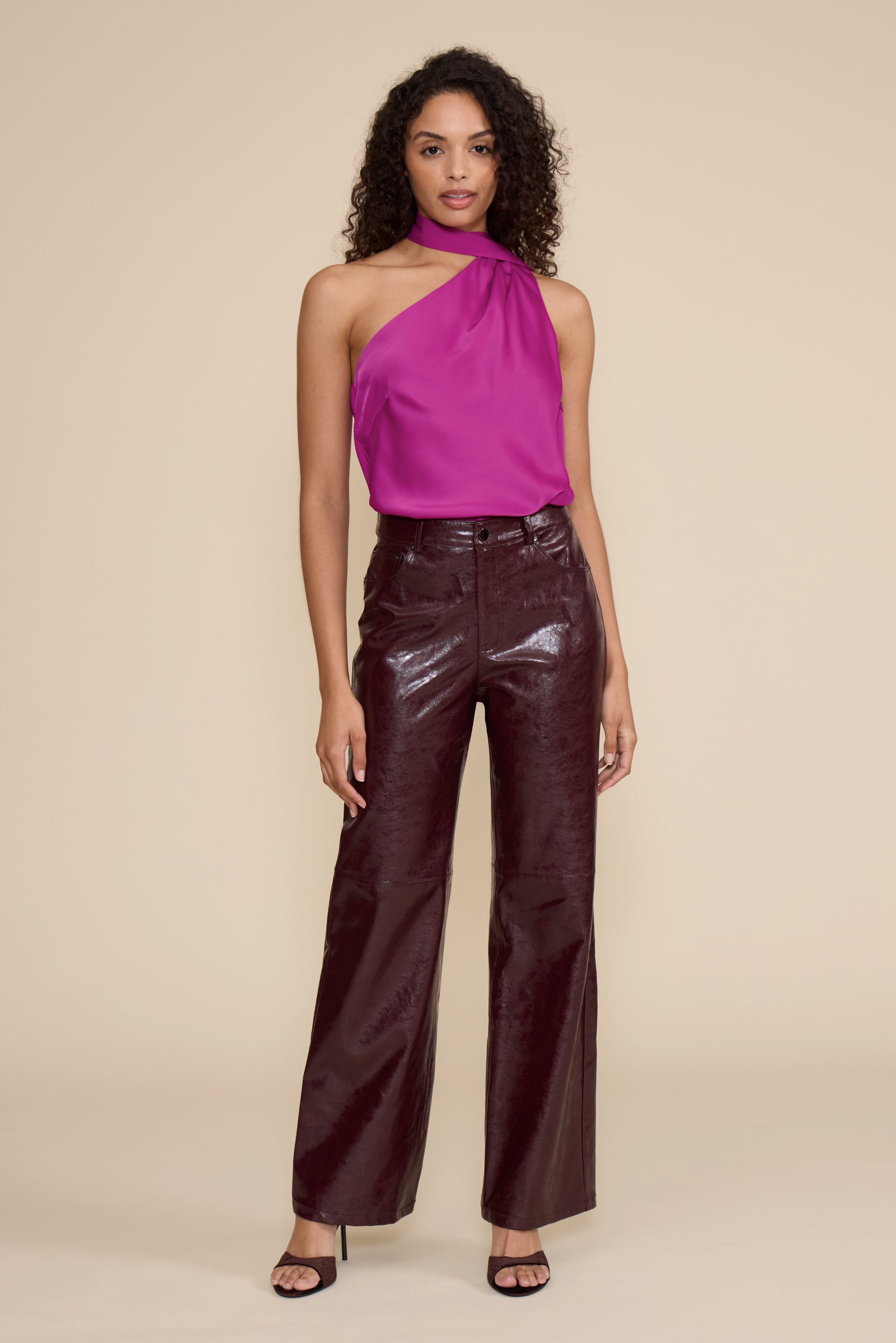 Cleo Faux Leather Pant in wine featuring a high-rise waist, straight-leg fit, and glossy faux leather finish.