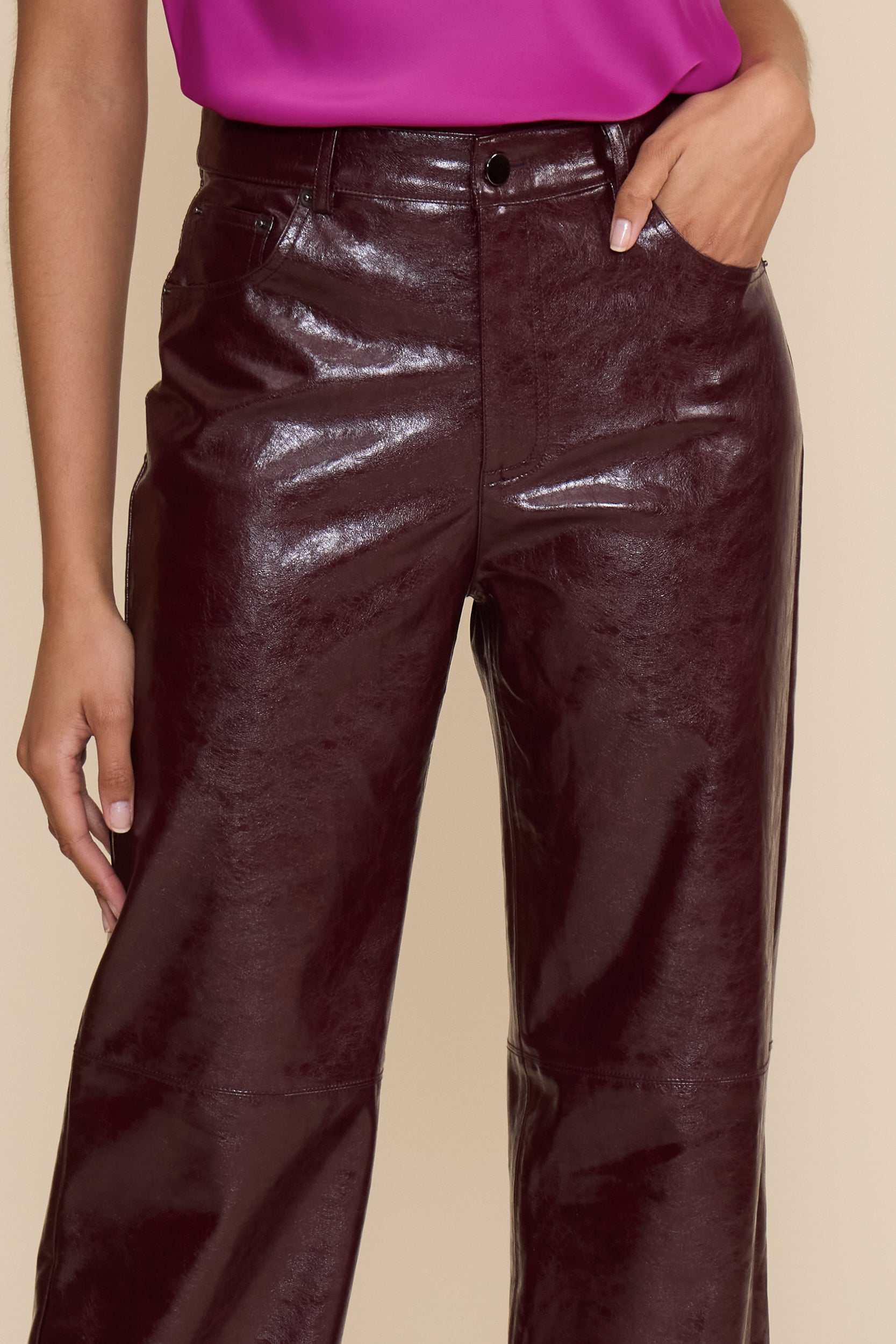 Cleo Faux Leather Pant in wine featuring a high-rise waist, straight-leg fit, and glossy faux leather finish.