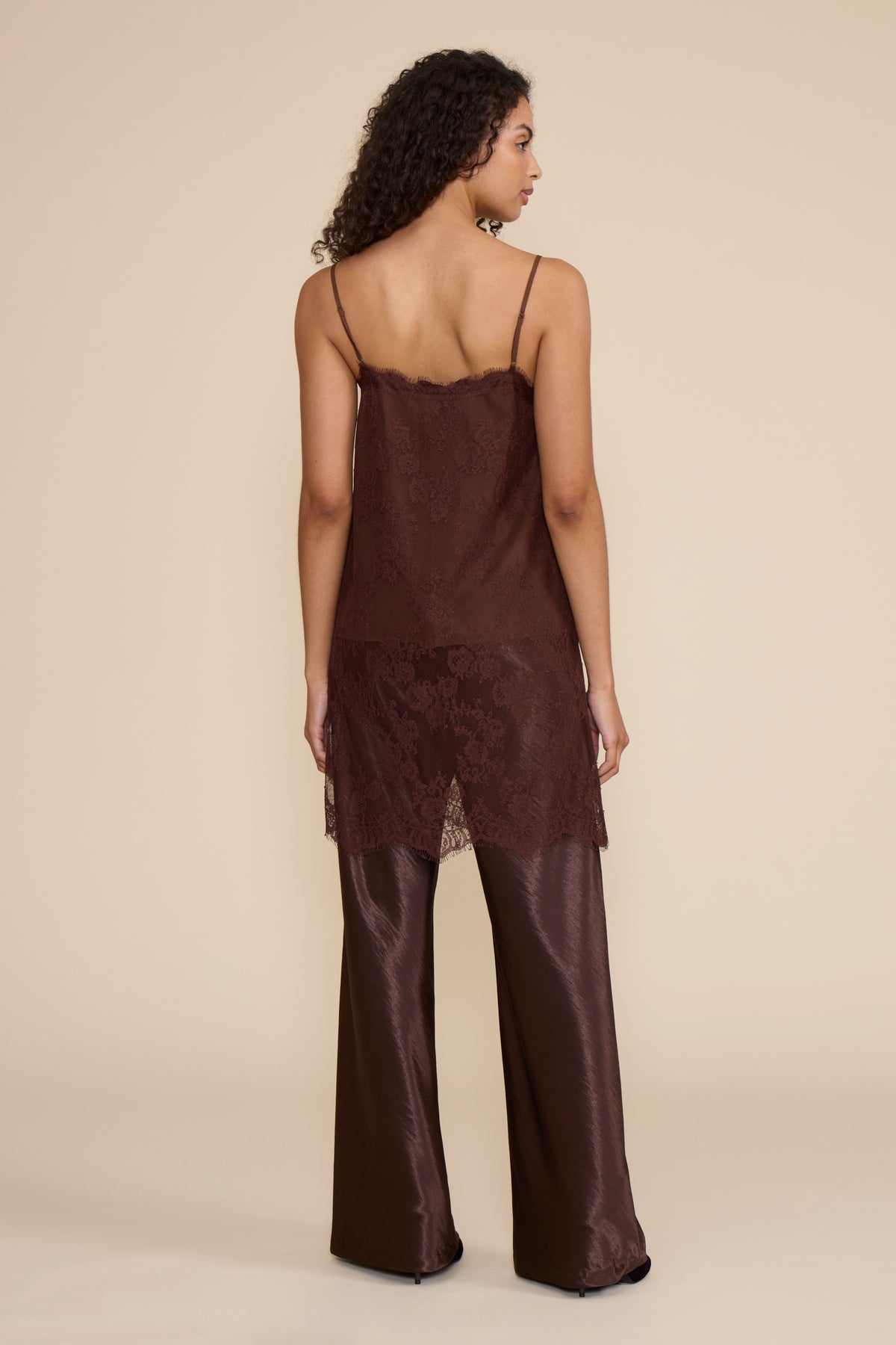 Gabrielle Lace Top in brown featuring all-over floral lace, slim spaghetti straps, a V-neckline, and relaxed silhouette.