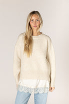 Pumice-colored Tanya sweater in a relaxed knit, featuring a classic crew neckline, dropped shoulders, long sleeves, and chunky ribbed trim at the neckline, cuffs, and hem.