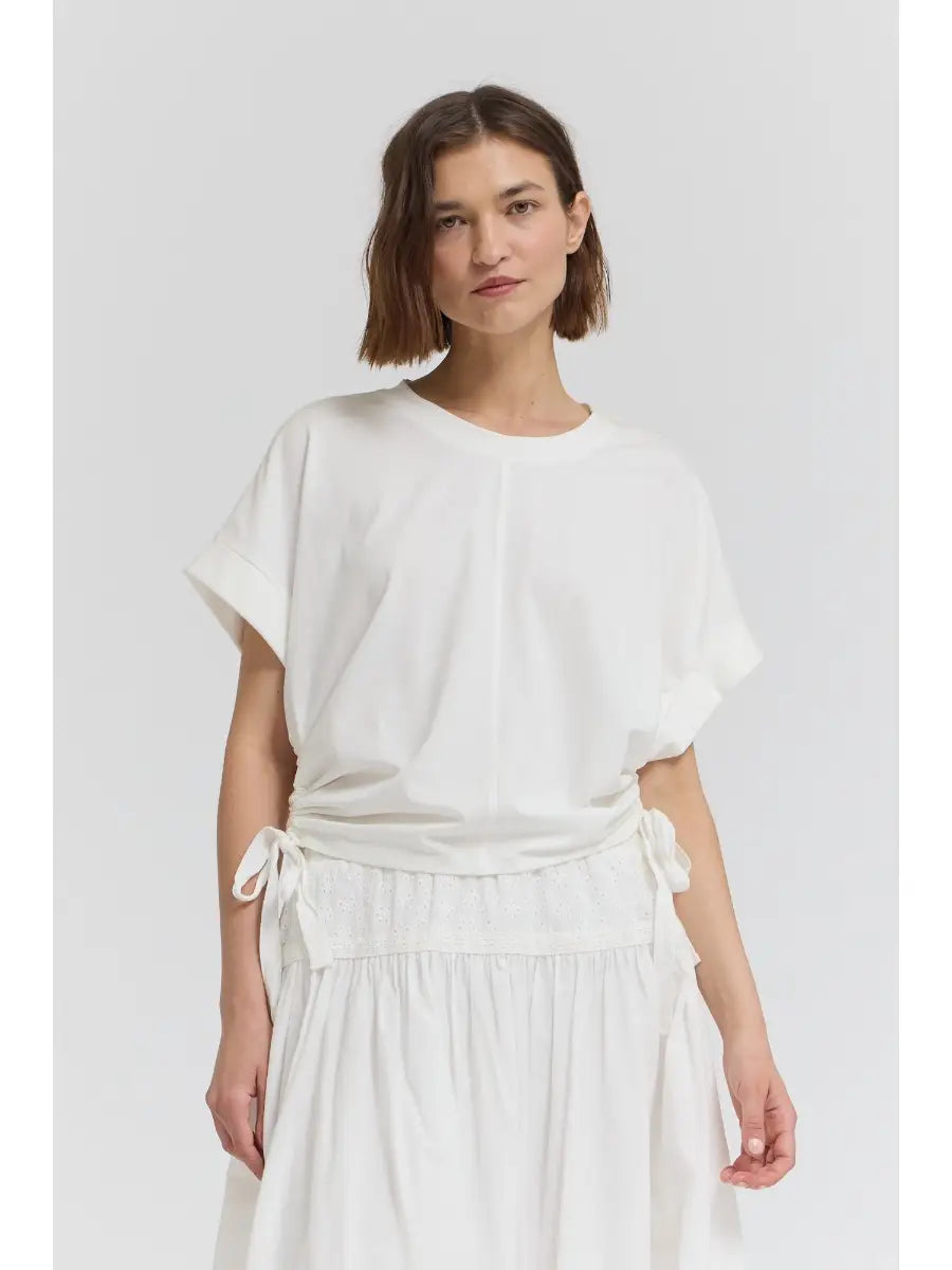 Side scrunch tee with adjustable ruched detailing along the side, creating a flattering contoured silhouette with a comfortable, easy fit.