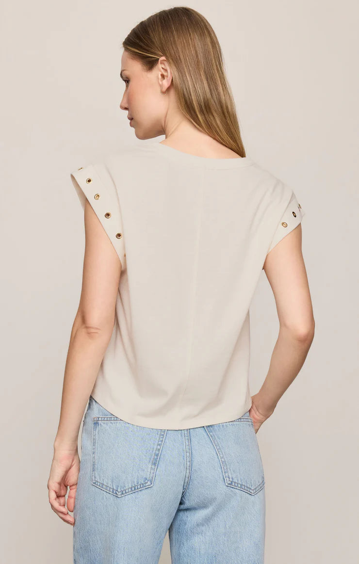 Relaxed muscle tee in soft cotton-blend jersey with gold metal grommet details at the arm openings. An elevated everyday basic with an effortless drape and versatile, modern silhouette.