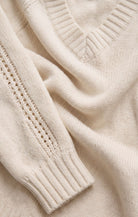 Close-up of the Z Supply Stratton V-Neck Sweater in Sandstone highlighting the soft 100% cotton Sienna Yarns knit, V-neckline, and fine knit texture.