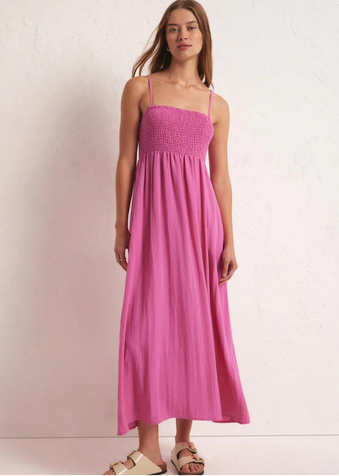 Z Supply Beachside Midi Dress - Heartbreaker Pink Vacation is calling!  The most perfect midi dress that is fit for the tropics.  Comfy, cute and flattering, it features: Fitted, Smocked Bodice Adjustable Straps Full Skirt Lined Regular Fit 90% Rayon 10% Nylon Style #ZD231223 Fits True to Size