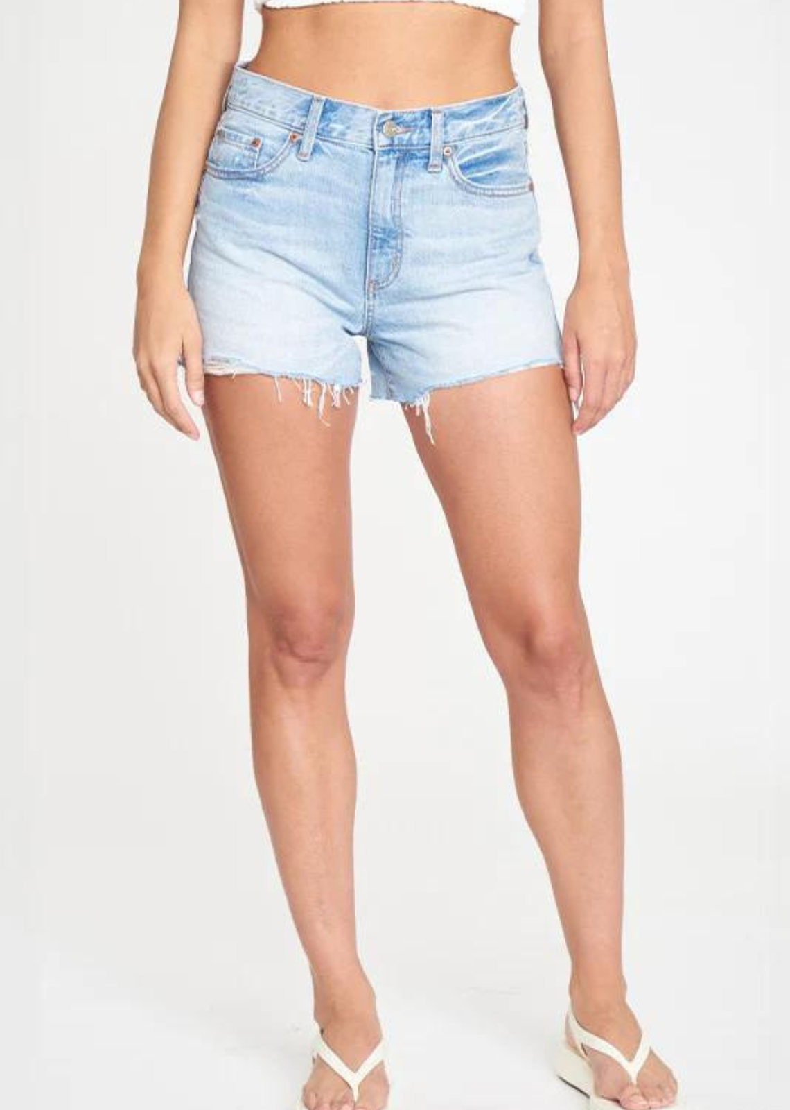 Daze Troublemaker High Rise Short. A light wash jean short in the most iconic fit of all time - the cutoff. With a versatile look and distressed hem, it is like a true vintage short.&nbsp;</span><span>Constructed in our most rigid fabric of 100% cotton materials, say hello to a timeless fit you can wear again and again.
