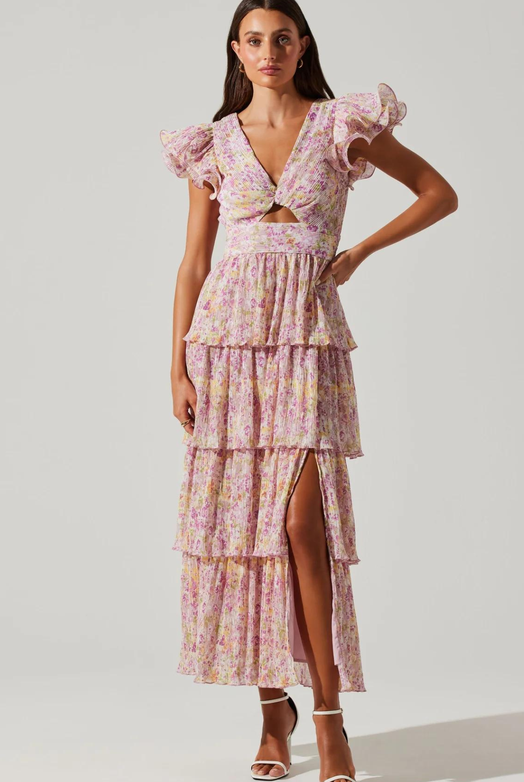 ASTR The Label Emporia Dress. Floral print, pleated finish, ruffle sleeves Center cutout, tiered midi-length skirt, side slit Concealed back zipper.