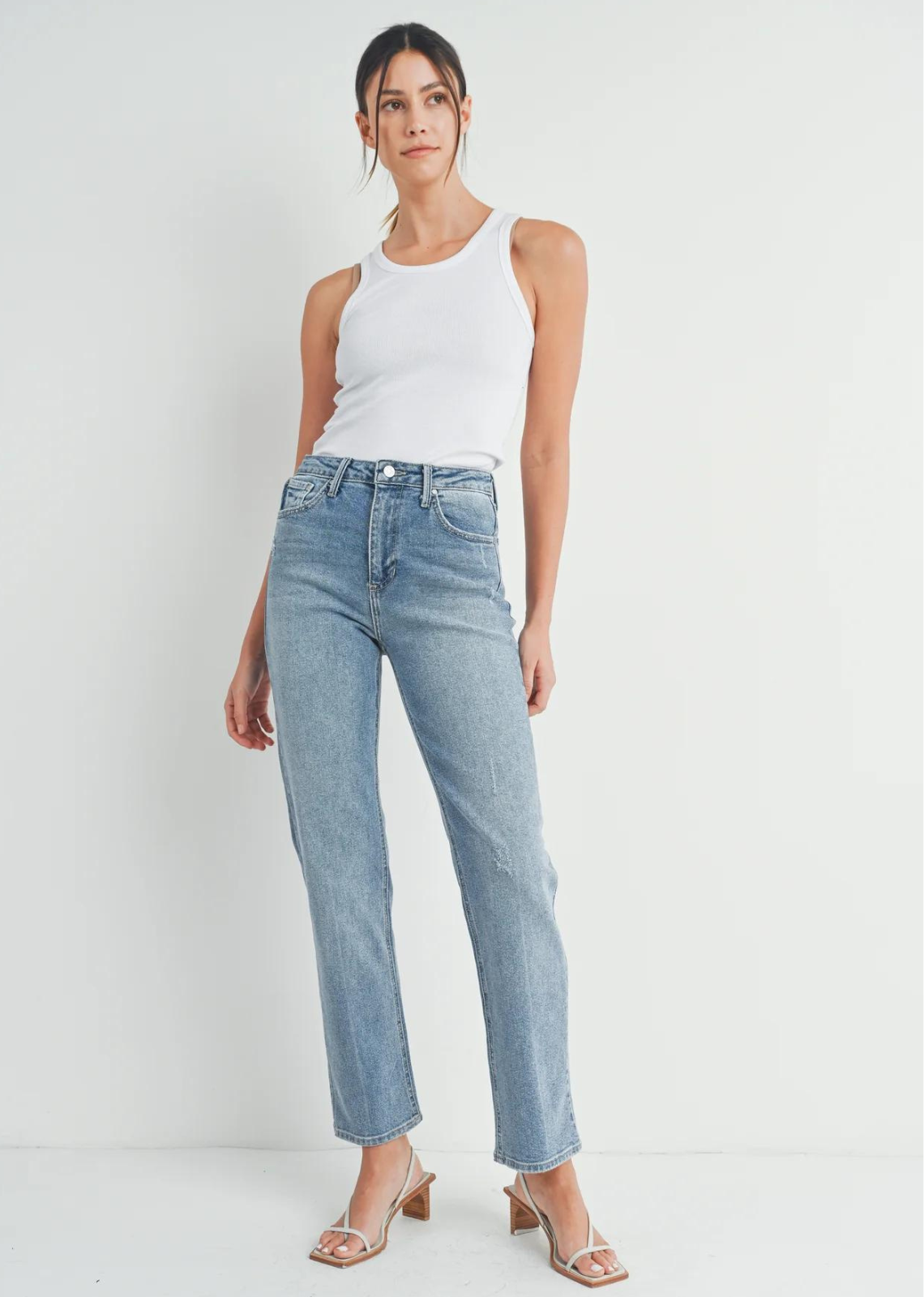 Just Black Denim The Everything Straight Jean.A high-waisted, medium rinse straight jean that’s everything you need for fall. Keep it casual with sneakers or dress it up with heels for an on-trend outfit every time.  