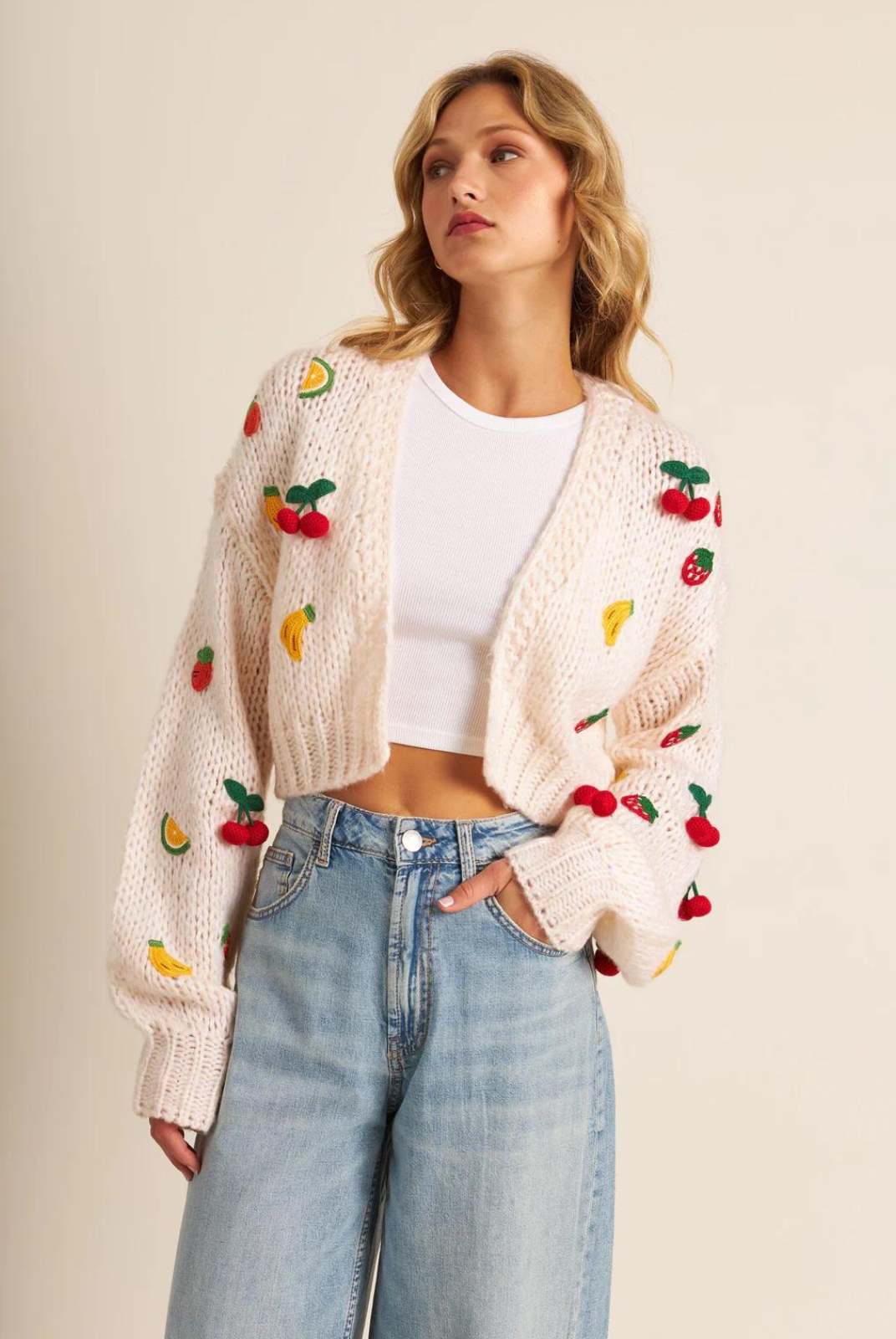 John & Jenn Rio Cardigan- Sunday Market. We don't like to pick favourites, but this open cardigan feels so special and really might be our absolute fav of the season. Stand out with this fruity cutie all season long!