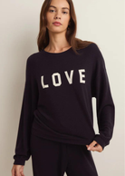 Z Supply Team Love LS Top We're on Team Love!  Relaxed Cloud Knit: 62% Polyester, 34% Rayon, 4% Spandex Screen print "love" Soft Brushed Knit Machine Wash Cold, Tumble Dry Low or Lay Flat to Dry, Do Not Dry Clean Style #ZLT241117