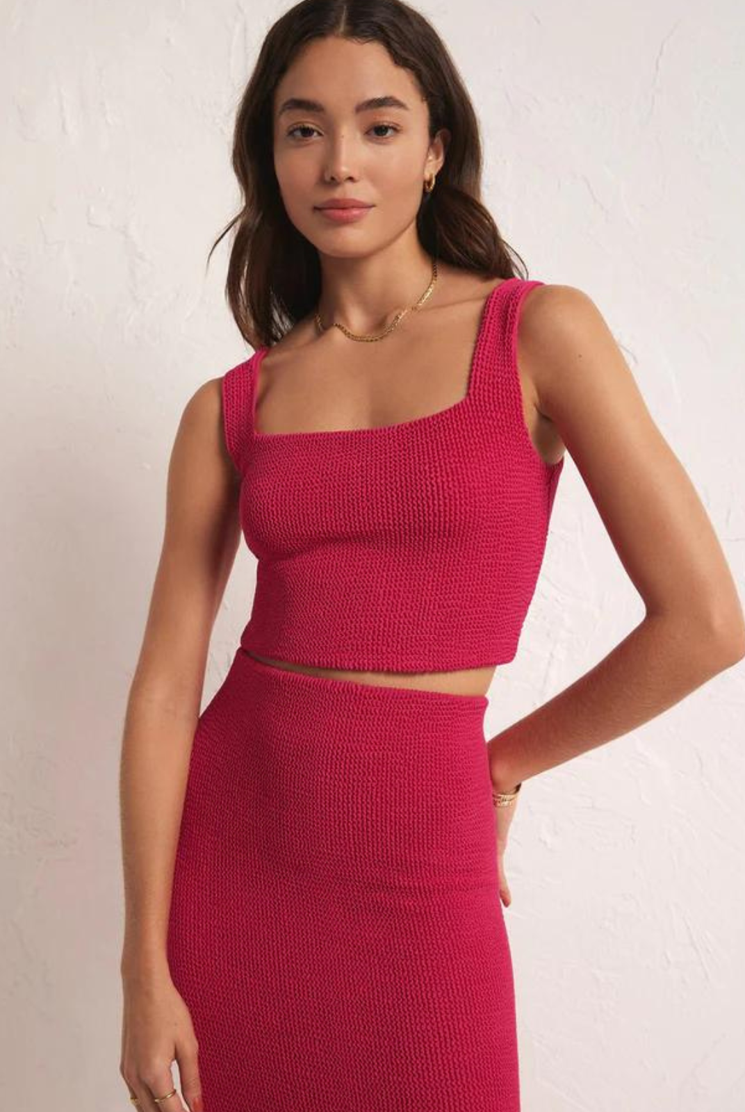 Z Supply Andez Crinkle Knit Tank. Keep it classy with this sleek tank. You'll love the bra friendly straps, flattering squared neckline, and meet and greet length.
