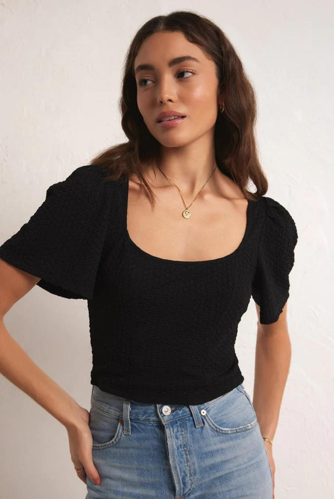 Z Supply Maxine Knit Top. With its rich, textured feel and flattering neckline, it's everything you're looking for. You'll love the princess seam details and flutter sleeves of this fun, feminine top.